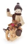 Miniatur Winterkind mit Teddy auf Schlitten H: 5,7cm