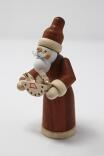 Miniaturfigur Weihnachtsmann mit Schaukelpferd Höhe 9 cm