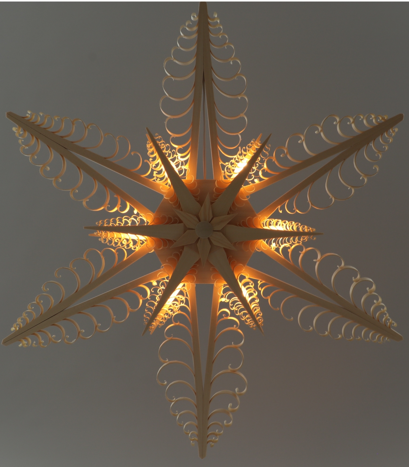 Spanstern Natur el. Beleuchtet LED Mitte mit Sterne (beidseitig) - Ansicht beleuchtet - Scheint