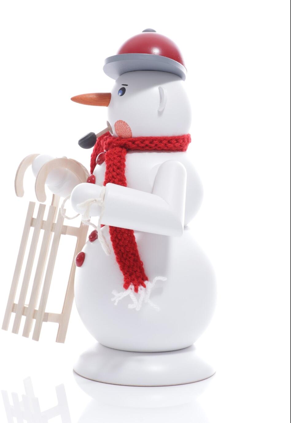 Seitliche Ansicht links vom Räuchermann Schneemann in Rot mit Hörnerschlitten, rotem Schal und Mütze