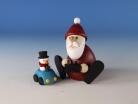 Miniaturfigur Weihnachtsmann mit ferngesteuertem Auto BxH 8,5x8,3cm