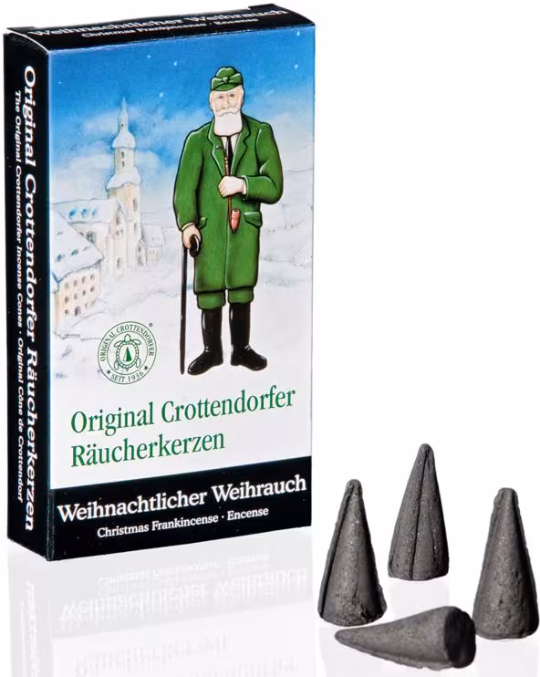 Räucherkerzen mit intensivem Weihrauchduft in Schwarz, kleine handgefertigte Kegel neben Verpackung