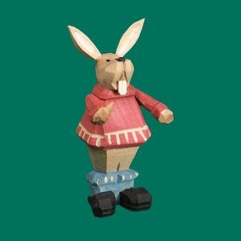 Osterhasenfigur – liebevoll geschnitztes Kind mit rotem Kleid und bemaltem Osterei – BxHxT = 5 x 9 x