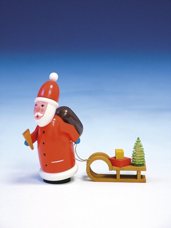 Weihnachtsfigur Weihnachtsmann mit Schlitten und Geschenken aus Holz, bunt bemalt von Fa.Knuth