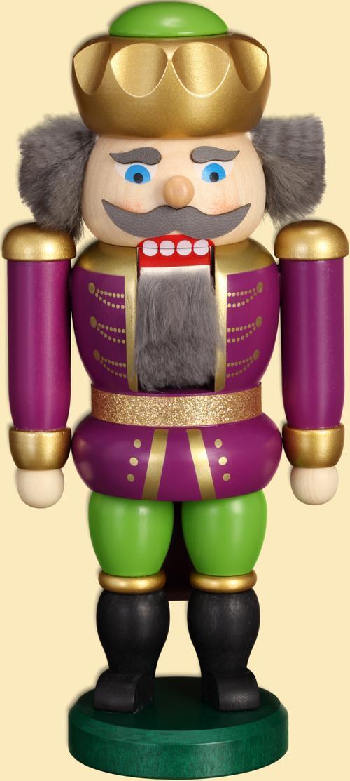 Nussknacker König mit goldener Krone in purpur-grüner Uniform, detailreich verzierte Holzfigur aus