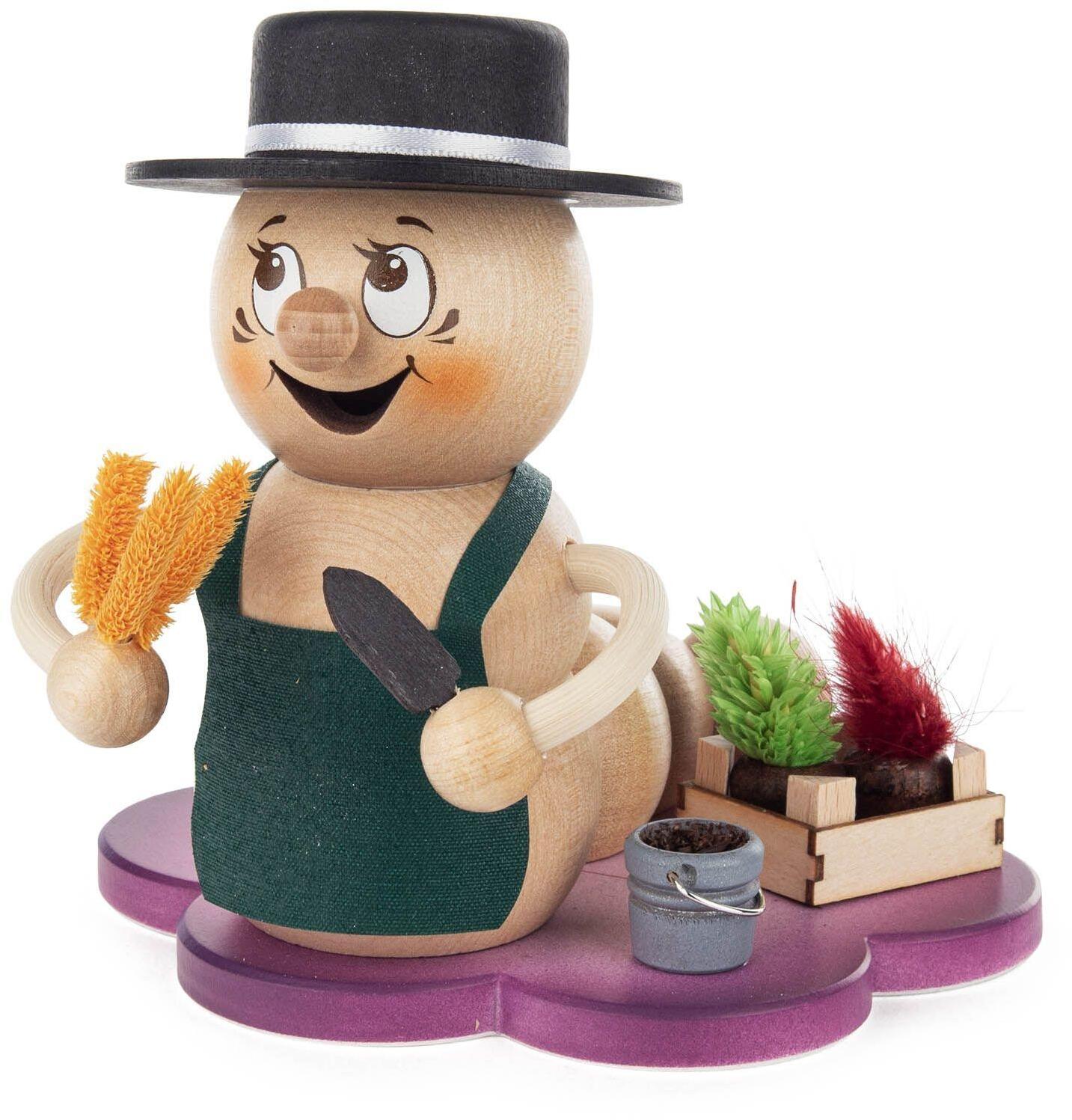 R&auml;ucherwurm &ndash; liebevoll bemalter G&auml;rtner mit Blume und traditionellem Hut, farbenfroh &ndash; H = 13 cm