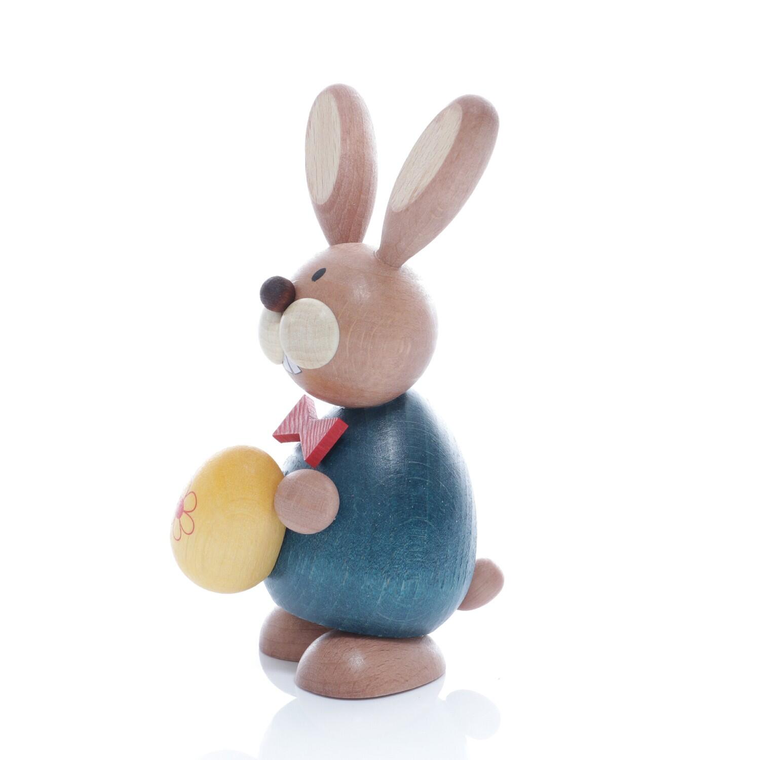 Osterfigur – detailreich bemalte Häsin mit gelbem Osterei und Blume – HxB ca. 11,5x5,5 cm