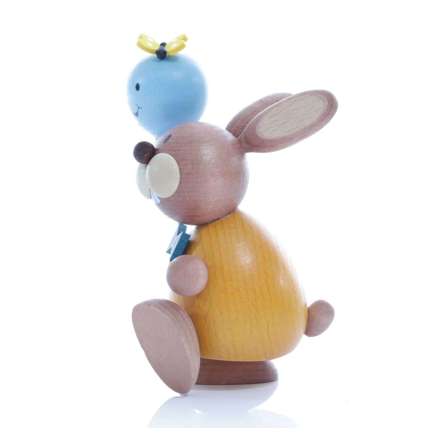 Osterfigur – handgefertigter, farbenfroher Osterhase mit blauem Luftballon – HxB ca. 12x5,5 cm