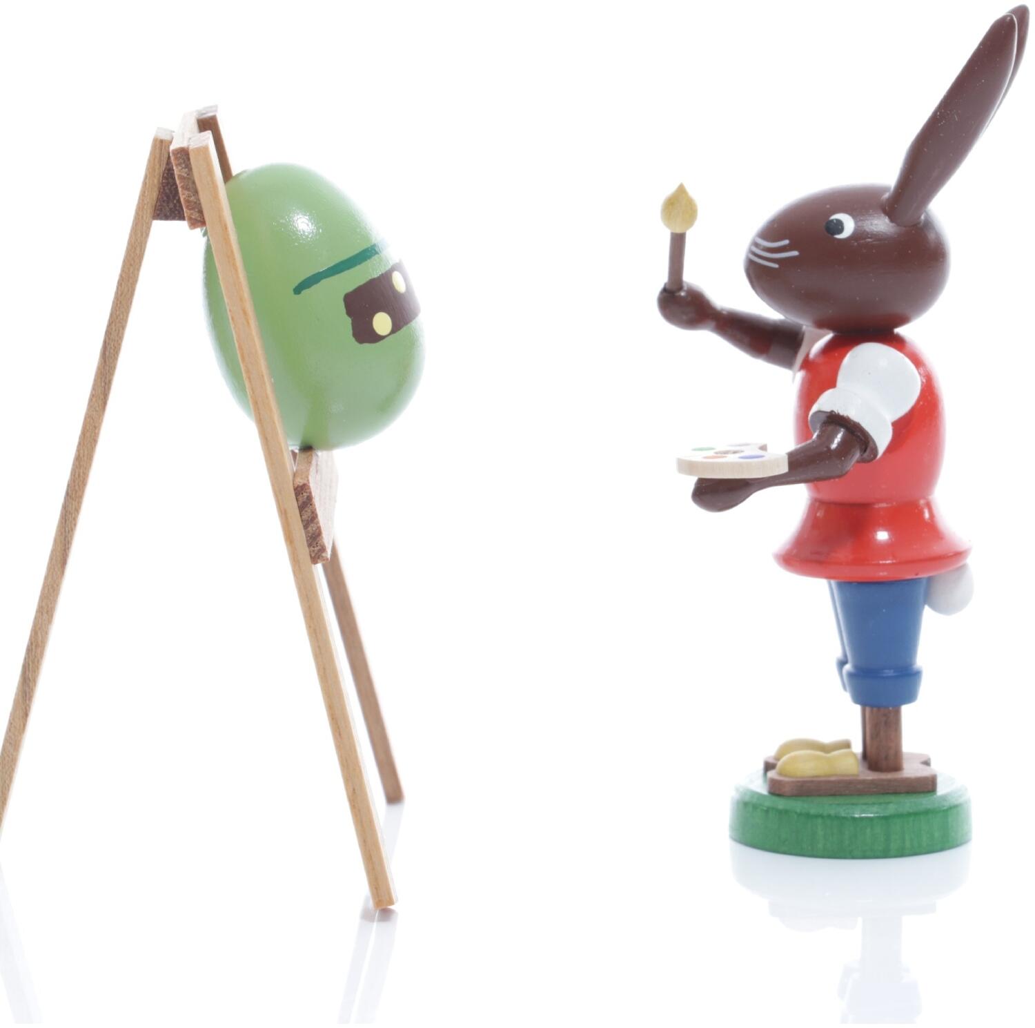 Osterfigur – handgefertigter, liebevoll bemalter Osterhase mit Staffelei & Osterei – BxHxT ca. 5x9x4 cm