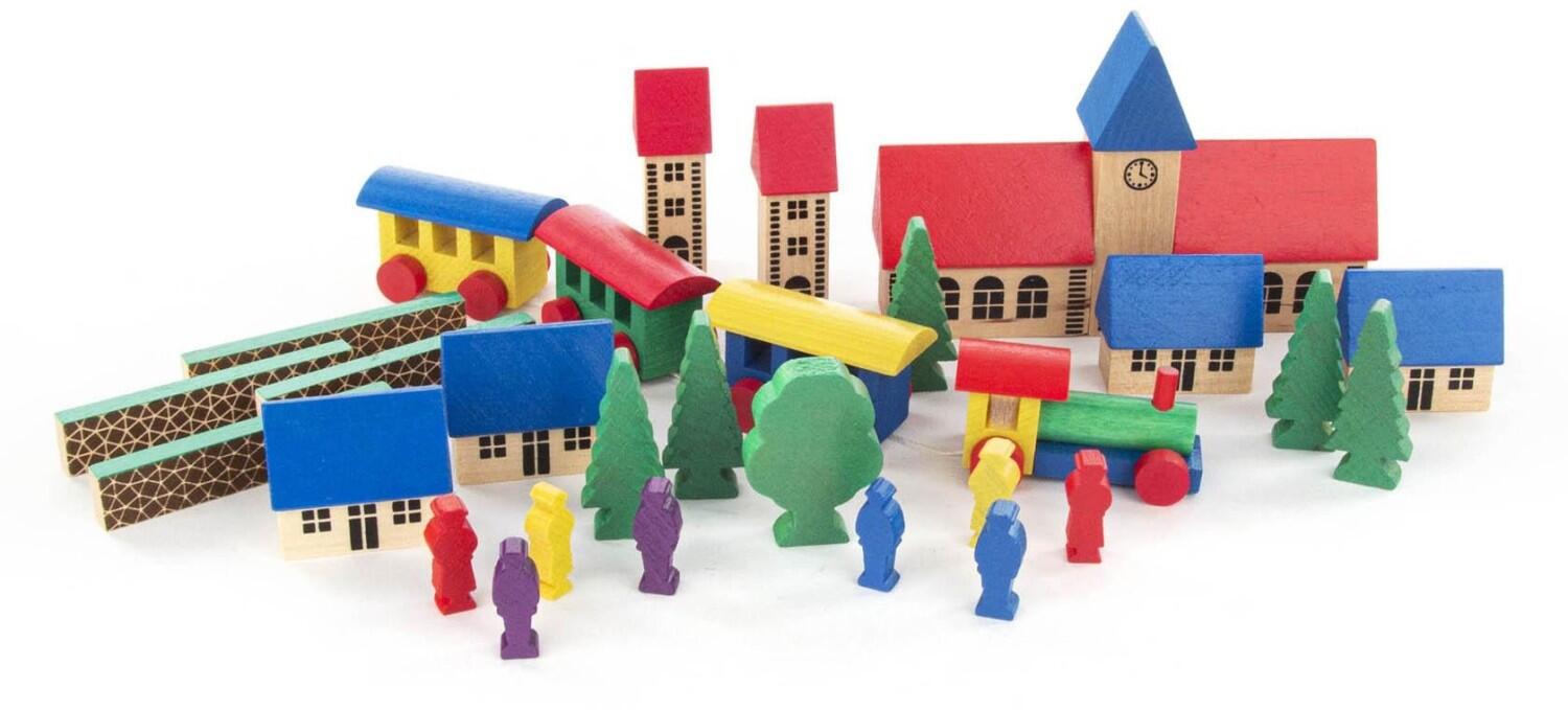 Holzspielzeug – detailreiches Dorf mit fröhlichem Personenzug und bunten Häusern, mehrfarbig – HxB = 8 x 25 cm