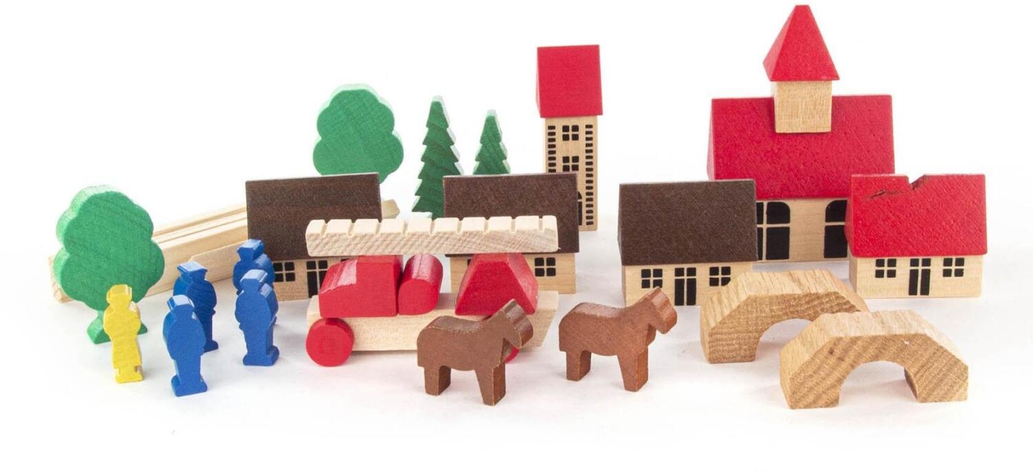 Holzspielzeug – farbenfrohes Dorf mit Feuerwehr, Kirche und Figuren, handbemalt – BxHxT = 20 x 7,5 x 15 cm