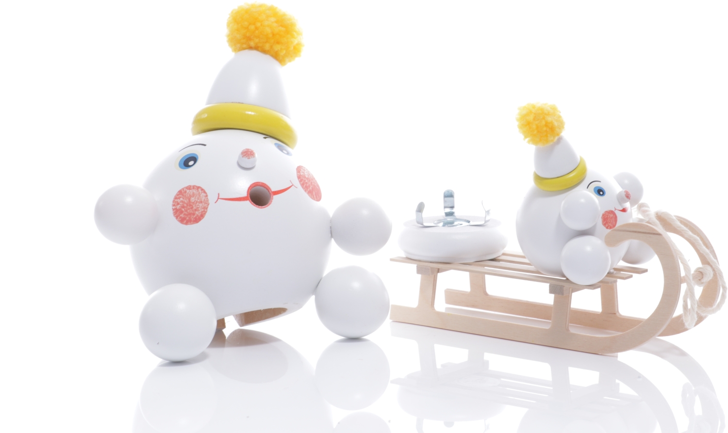 Räucherfigur - Räucherschneeball Gelb mit Mini Schneeball auf Schlitten - BxHxT 18x18x13cm