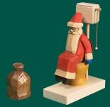 Räuchermann Weihnachtsmann auf der Toilette klein geschnitzt