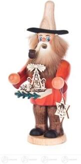 Räuchermann – detailreicher Erzgebirgshändler mit grünem Mantel und Miniaturspielzeug – BxHxT = 8 x 