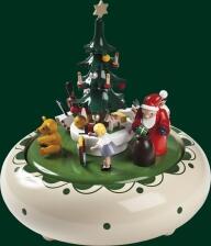 Spieluhr &ndash; detailreiche Bescherung mit Weihnachtsmann und bunten Figuren, wei&szlig;er