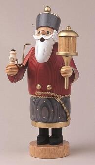 Räuchermann Caspar aus dem Erzgebirge mit rotem Mantel und goldener Krone, detailreiche Holzfigur