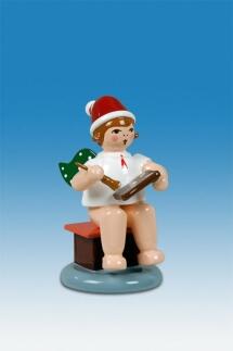Holzfigur Bäckerengel mit Pfefferkuchen und roter Mütze von KDE-Kunstgewerbliche Drechslerei