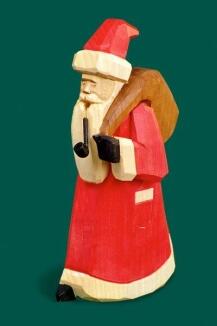 Räuchermann – liebevoll geschnitzter Weihnachtsmann mit roter Robe, Geschenkesack und Laterne – H = 