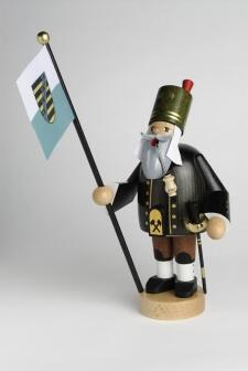 Räuchermann detailverliebter Bergmann mit grüner Uniform, Steigerstab und Sachsenfahne aus dem