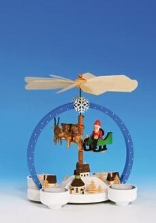 Tischpyramide – detailreicher Weihnachtsmann mit Spielzeugdorf, bunt bemalt – HxB = 25 x 15 cm