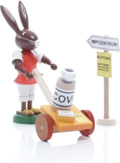 Osterfigur - Osterhase Impfhelfer Corona mit Medizin auf dem Wagen - Ansicht Vorne - Arzthelfer