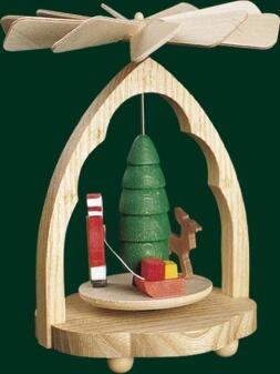 Wärmespiel detailreicher Weihnachtsmann auf buntem Schlitten im naturfarbenen Holzgestell aus dem