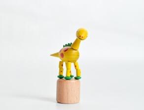Holzspielzeug Wackelfigur Dinosaurier gelb Höhe=9cm