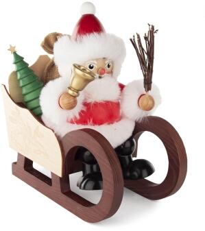 Räuchermann – fröhlicher Weihnachtsmann mit Glocke und Rute auf detailreichem Schlitten, farbenfroh