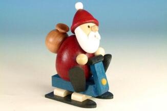 Holzfigur Weihnachtsmann auf Schlitten mit Geschenkesack, bunt bemalt von Kunsthandwerk Ullrich,