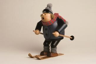 Räuchermann – detailreicher Abfahrtsläufer mit Skibrille und Bommelmütze, blau-dunkel gekleidet –