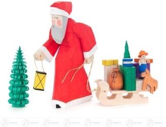 Schnitzerei Weihnachtsmann geschnitzt mit Schlitten und Bäumchen aus Holz von Großhandel Dregeno,