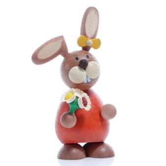 Osterfigur - Osterhäsin mit bunten Blumenstrauß und gelber Schleife