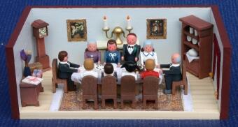 Miniaturstube – festliche Geburtstagsgesellschaft mit detailreichen Möbeln und farbenfrohem Design