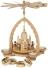 Pyramide Frauenkirche mit drehenden Kurrendefiguren aus naturfarbenem Holz, warm beleuchtet,