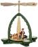 Pyramide – detailreicher Weihnachtsmann bei Bescherung mit drehendem Spielzeug, grüne Akzente, Holz
