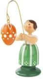 Blumenmädchen – frühlingshaftes Mädchen mit orangem Osterei und grün-weiß Rock – HxBxT 9 x 4 x 4 cm