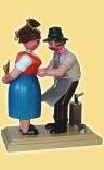 Räuchermann – lebhafter Holzhacker mit Ehefrau im bunten Dirndl, detailreich bemalt – HxB = 22 x 10 